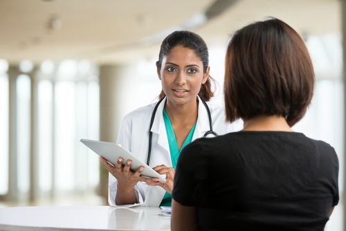 doctor explaining to patient shutterstock_110078714